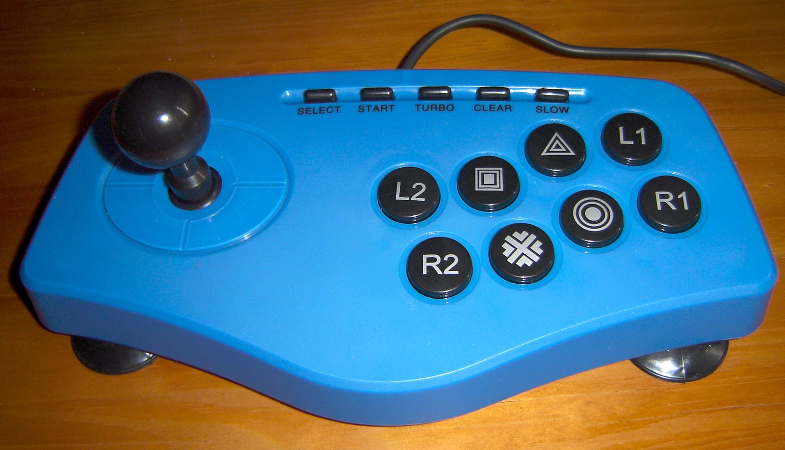 Arcade controller with a joystick and separate action buttons